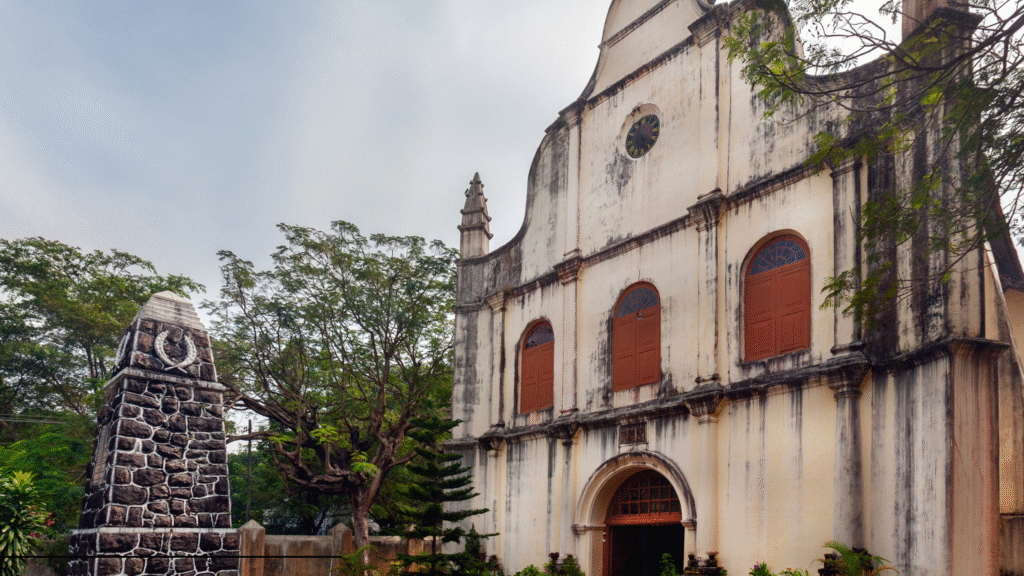 St Francis Church Fort Kochi showing Portuguese colonial architecture with yellow walls and wooden ceiling in Kerala