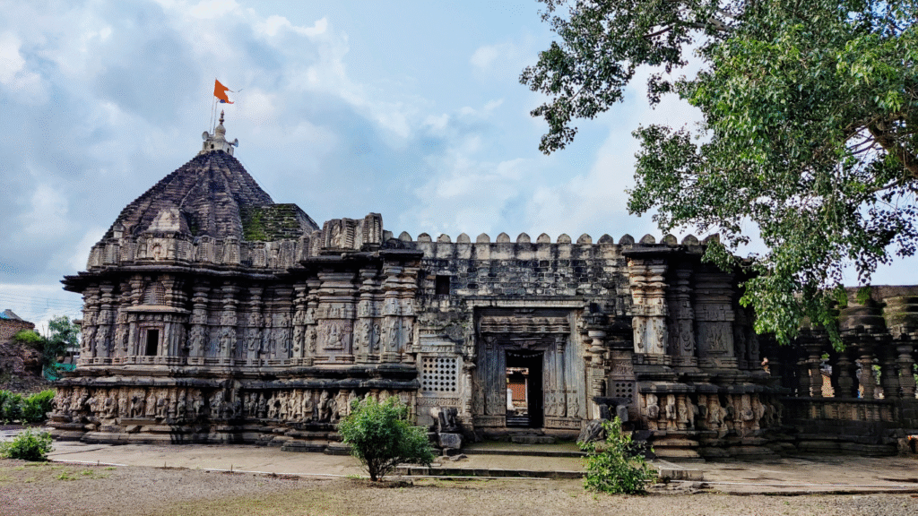 Intricate carvings on the walls of the 12th-century Kopeshwar Temple in Kolhapur Maharashtra, featuring a unique open-to-the-sky sanctum